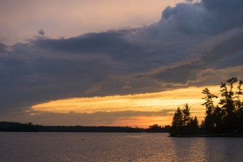 Clouds over the lake at sunset, Lake of The Woods, Ontario, Canada