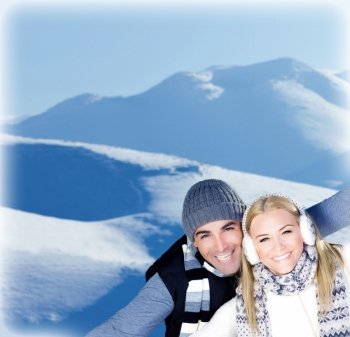 Happy couple having fun, outdoors at winter snowy mountains, people at nature, blue wintertime landscape background, Christmas vacation holidays, love concept border