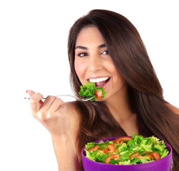 Closeup portrait of beautiful brunette woman eating salad isolated on white background, organic food, healthy lifestyle, dieting concept