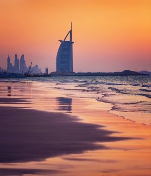 DUBAI, UAE - NOV 24: Burj Al Arab is 321m, second tallest hotel in the world, luxury hotel stands on an artificial island,November 24, 2014 Jumeirah beach, Dubai, United Arab Emirates