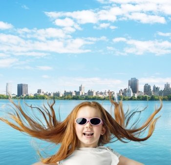 Ginger girl over the town background