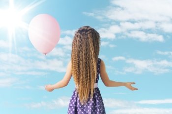 Little girl and the pink balloon