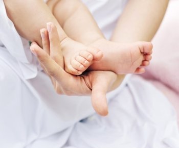 Image presenting cute baby's feet