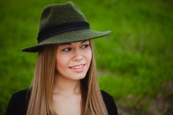 Portrait of a pretty girl wearing hat 