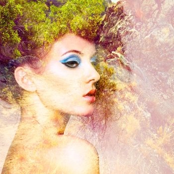 Portrait of beautiful sensual woman with elegant hairstyle.  Fashion photo. Double exposure portrait of woman combined with photograph of nature