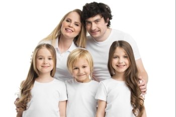 Portrait of family with children. Studio portrait of family in white clothes with three children isolated on white background