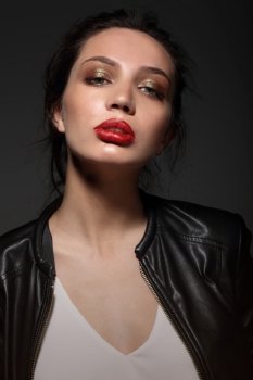 Portrait of beautiful girl with red lips. Fashion trend. Professional and stylish.