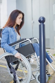 woman with wheelchair outdoors