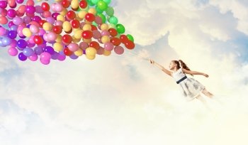 Little girl playing. Image of little pretty girl playing with balloons