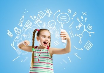 Kid in anger. Image of little angry girl shouting in mobile phone