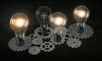 Producing energy. Glowing light bulbs and gears mechanism on dark background