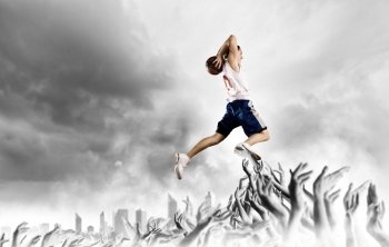 Basketball player. Young man basketball player with ball in hands jumping high