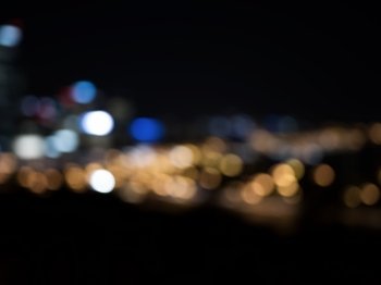 Night city life. Blurred bokeh lights of night big city 