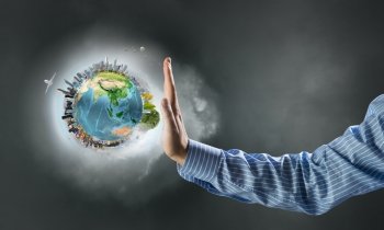 Green Earth planet concept. Close up of human hands holding Earth planet. Elements of this image are furnished by NASA