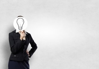 Head of ideas. Unrecognizable businesswoman hiding her face behind bulb shaped mask