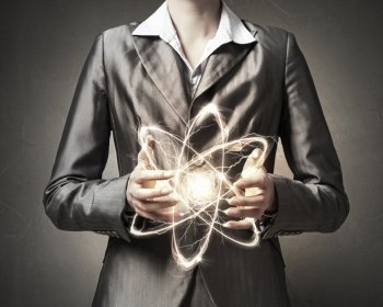 Atom molecule in hands. Close view of woman scientist presenting atom research concept