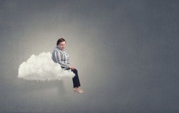 Stout woman. Plus size woman in casual sitting on cloud