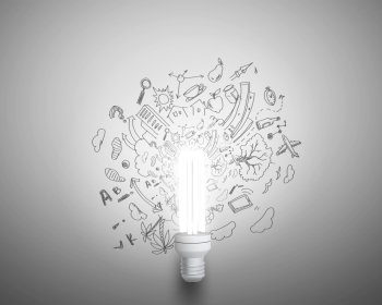 Bright ideas. Conceptual image of light bulb and business sketches