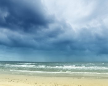Sea view. Sea shore view image with clouds above
