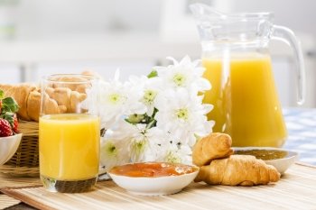 Breakfast with assortment of pastries, coffees and fresh juice