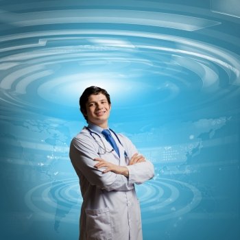 Male doctor thinking. Young concentrated male doctor with arms crossed against digital background