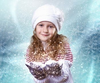 Cuty little girl in winter wear happy about new year