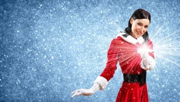 Portrait of girl wearing santa claus clothes. Portrait of beautiful girl wearing santa claus clothes on red background