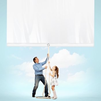 Man and little girl pulling banner. Man and little girl pulling banner. Place for text