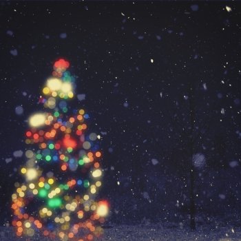 Christmas night, blurred noel backgrounds with decorations light, beauty bokeh and snowfall