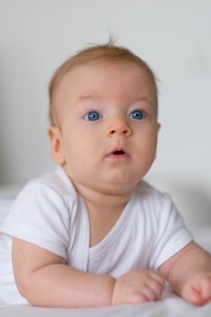 Four months old baby with blue eyes