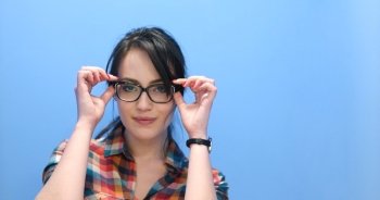 Attractive Young Woman Wearing glasses on colorfull background