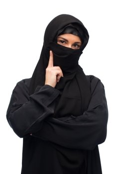 religious, attention, warning and people concept - muslim woman in hijab over white background. muslim woman in hijab over white background