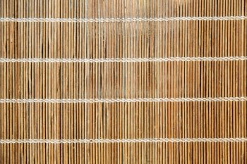 background and texture concept - natural bamboo mat or makisu. natural bamboo mat or makisu