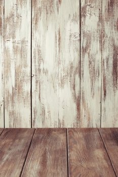 Old shabby white wooden wall and gray floor for design. Old shabby wooden wall 