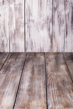 Old shabby white wooden wall and gray floor for design. Old shabby wooden wall 