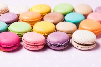 Colorful macaroons - french dessert as a background. The Colorful macaroons 