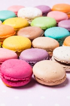 Colorful macaroons - french dessert as a background. The Colorful macaroons 