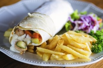 Burrito with grilled chicken and vegetables
