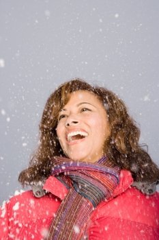 Woman laughing in the snow