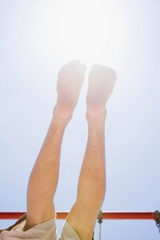 Legs of a person and sunlight