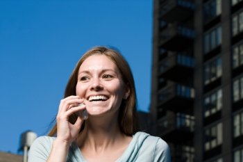 Happy woman on mobile phone