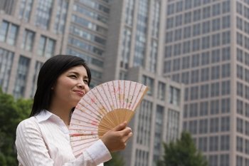 Chinese woman with a handfan