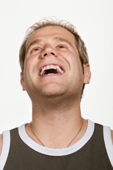 Portrait of mid adult Caucasian man laughing