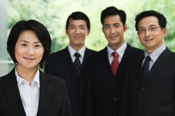 Four Chinese businesspeople