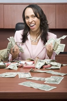Businesswoman holding money