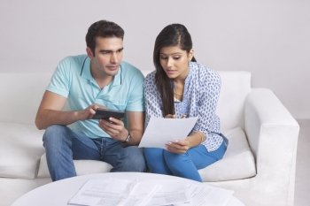 Couple calculating their finances