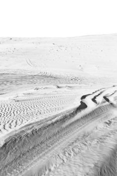   in the sand and direction texture oman desert track of some cars