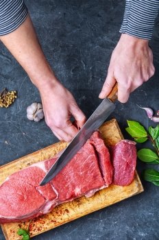 beef stead on wooden cutting board