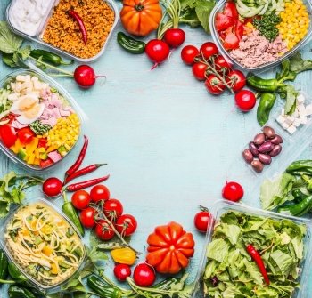 Healthy eating background with Variety of  vegetable and vegetables salad bowls. Fitness or diet  nutrition. Take away lunch ideas. Top view, frame