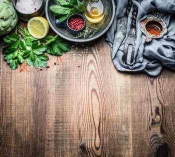 Fresh condiment and seasoning food setting on rustic kitchen table background, cooking preparation, top view, copy space